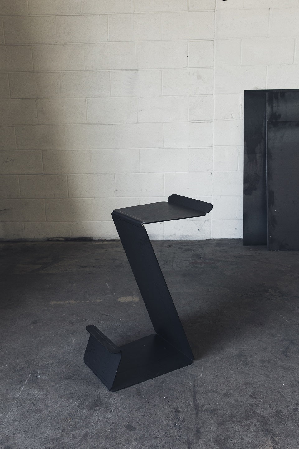 Fe Counter or Bar Height Zig Zag Stool in Raw Black Steel by MTHARU